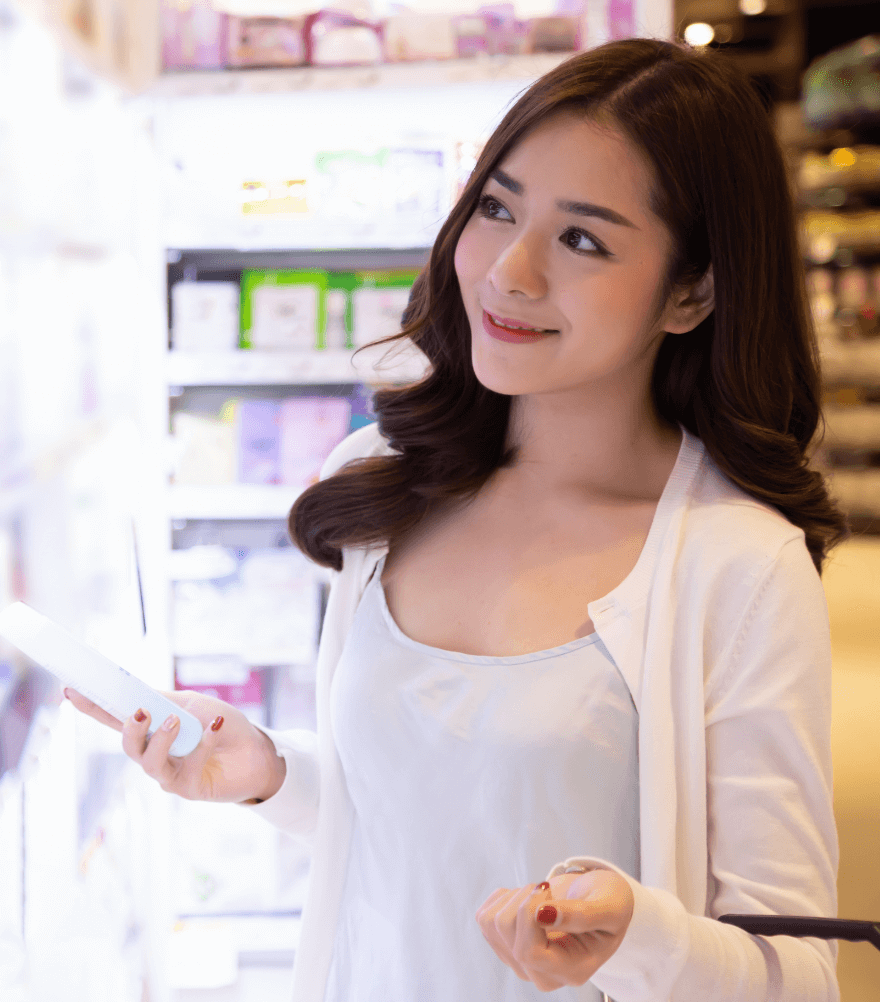 Girl looking at shelf with products